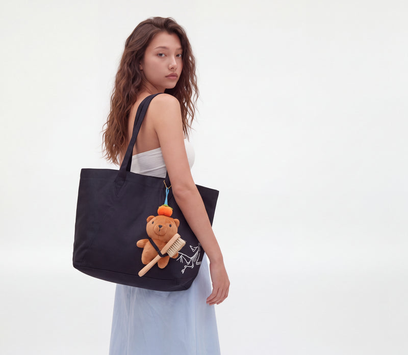 Load image into Gallery viewer, Peb Plush Bag Charm + Brush
